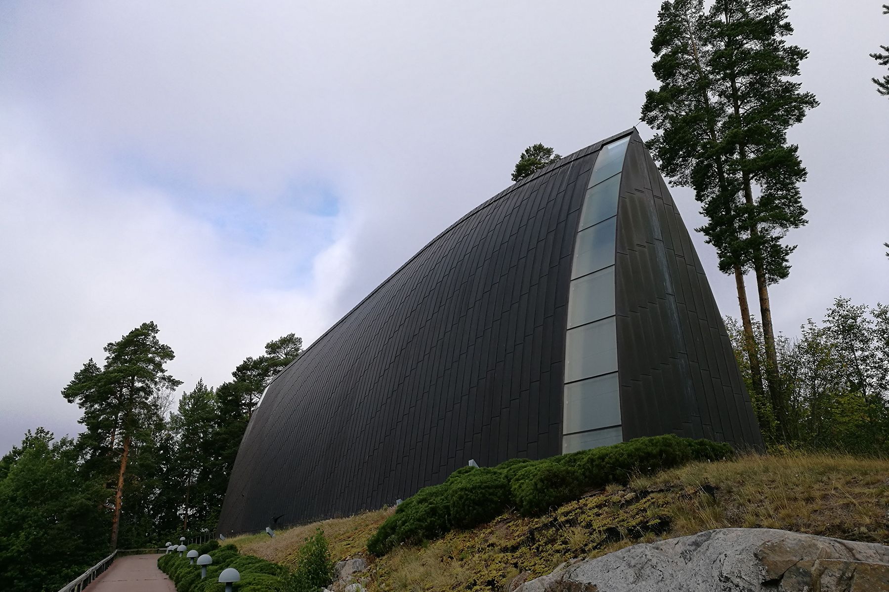 An external view of the Art Chapel, which looks like an upturned boat.
